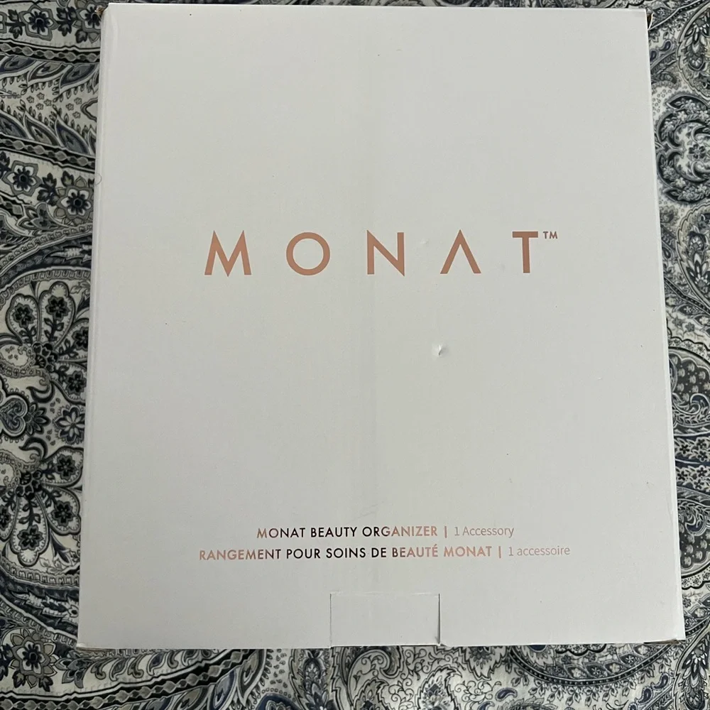 Gently used MONAT makeup turntable